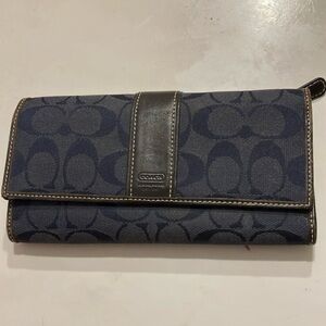 Coach Navy and Brown Signature Wallet New never used. 4” height 8” length